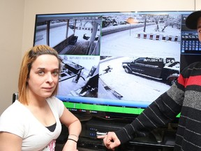 Gino Donato/The Sudbury Star
Julie Rose and her partner Jeff Schaffer show their surveillance footage that shows a man falling from their roof at 223 Mountain St., where another man was found in a state of medical distress earlier this week in an upstairs apartment. The man later died in hospital.