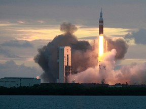 The Delta IV Heavy rocket with the Orion spacecraft lifts off from the Cape Canaveral Air Force Station in Cape Canaveral, Fla., on December 5, 2014. (REUTERS/Scott Audette)