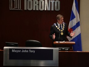 Mayor John Tory at his swearing-in ceremony on Dec. 2, 2014. (Craig Robertson/Toronto Sun)