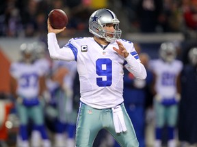 Tony Romo (9) throws a pass during the second quarter against the Chicago Bears at Soldier Field on Dec 4, 2014 in Chicago, IL, USA. (Dennis Wierzbicki/USA TODAY Sports)