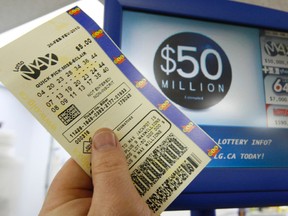 A Lotto Max ticket purchased at a Front St. convenience store could be the potential winner for the $50 million prize.  Jack Boland / Toronto Sun