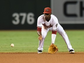Didi Gregorius of the Arizona Diamondbacks makes a play on a ground ball during NL play against the Colorado Rockies at Chase Field on August 29, 2014 in Phoenix. (Norm Hall/Getty Images/AFP)