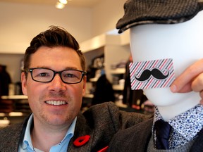 Jay Rayner shows off his early growth of whiskers in the first days of the Movember campaign at the Chris James clothing store in Kingston. (IAN MACALPINE/KINGSTON WHIG-STANDARD/QMI AGENCY
