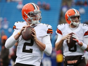 Johnny Manziel (left) will watch fellow quarterback Brian Hoyer from the sideline — at least to start the game — at home on Sunday against the Colts. (AFP)