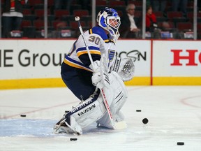 St. Louis Blues goalie Martin Brodeur warms up prior to a game against the Chicago Blackhawks at the United Center. (Dennis Wierzbicki/USA TODAY Sports)