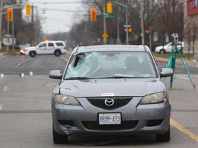 A car involved in a fatal collision with a pedestrian on Dec. 6, 2014. (Chris Doucette/Toronto Sun)
