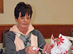 Vulcan resident Sandy Fulton, a member of the Vulcan and District Chamber of Commerce, volunteered to help run the gift wrapping station at the Vulcan Lodge Hall, where the inaugural Black Friday bazaar was held from 9 a.m. to 9 p.m. The bazaar was a success, but it was also a long day at 12 hours, so organizers plan to re-evaluate its duration for next year, said chamber president Lyle Magnuson. Vulcan Advocate file photo