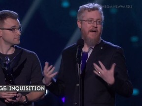 Caption: BioWare Edmonton General Manager Aaryn Flynn (left) and Dragon Age Executive Producer ​Mark Darrah accept the Game of the Year award for Dragon Age Inquisition at the 2014 Game Awards in Las Vegas on Friday, December 5, 2014. (Screenshot)