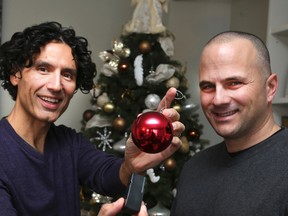 Two local entrepreneurs, Stefano Karbas ,left, and Joe Pantaleo, developed a way to turn your Christmas lights on and off with the switch of a Christmas ornament.  (Veronica Henri/Toronto Sun)