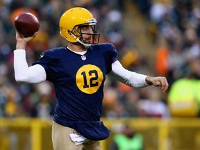 Quarterback Aaron Rodgers of the Green Bay Packers looks to pass against the Philadelphia Eagles during the first quarter of the game at Lambeau Field on November 16, 2014. (Ronald Martinez/Getty Images/AFP)