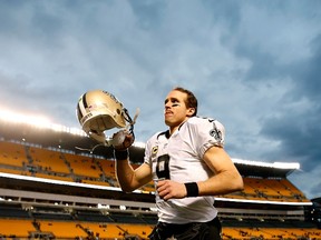 Drew Brees of the New Orleans Saints runs off the field after a 35-32 win over the New Orleans Saints at Heinz Field on November 30, 2014.  (Gregory Shamus/Getty Images/AFP)