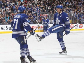 Joffrey Lupul of the Maple Leafs celebrates a goal against the Vancouver Canucks at the Air Canada Centre on Saturday. (AFP)