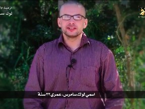 Luke Somers speaks in this still image taken from video purportedly published by al-Qaida in the Arabian Peninsula (AQAP). REUTERS TV