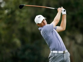 Jordan Spieth hits his tee shot on the third hole during the final round of the Hero World Challenge at the Isleworth Golf & Country Club on December 7, 2014 in Windermere, Florida. (Scott Halleran/Getty Images/AFP)
