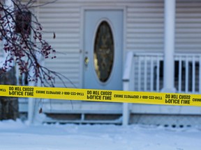 Police are at the scene of a suspicious death that occurred Saturday night at 188 Street and 122 Avenue in Edmonton, Alta., on Sunday, Dec. 7, 2014. Codie McLachlan/Edmonton Sun/QMI Agency