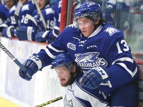 Sudbury Wolves defenceman Jonathan Duchesne and Mississauga Steelheads' Bobby MacIntyre collide during second-period OHL action at Sudbury Community Arena on Sunday afternoon.