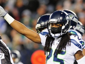 Richard Sherman #25 of the Seattle Seahawks reacts against the Philadelphia Eagles in the first half of the game at Lincoln Financial Field on December 7, 2014 in Philadelphia, Pennsylvania. (Evan Habeeb/Getty Images/AFP)
