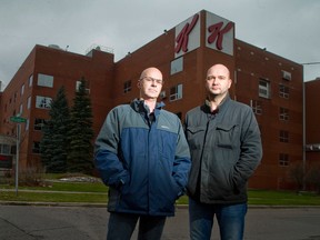 Bob Martin, left, president of Local 154G of the Bakery, Confectionery, Tobacco Workers and Grain Millers union, and chief steward Brad Dwyer stand outside the London Kellogg plant that will close this month. (CRAIG GLOVER, The London Free Press)
