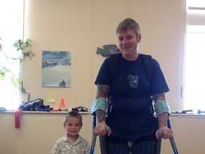 Denny Ross with a ReWalk exoskeleton device. (Supplied)