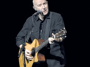 Midge Ure, fresh off his work on the 30th anniversary rendition of Do They Know Its
Christmas?, performs in Hanover last week. (WENN)