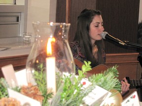 Jessica Allossery sings her song “Change the World” during Chatham's Ceremony of Remembrance and Hope to mark the 25th Anniversary of the Montreal Massacre. The ceremony was held Dec. 6 at Villa Angela.