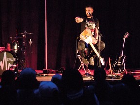 Robb Nash, formerly of the band LOA, interacts with students during his presentation at PNSS on Thursday, Dec. 4, 2014. Greg Cowan photo/QMI Agency