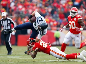 Cooper Helfet of the Seattle Seahawks is tackled by Eric Berry of the Kansas City Chiefs during NFL play at Arrowhead Stadium on November 16, 2014 in Kansas City, Missouri. (Wesley Hitt/Getty Images/AFP)