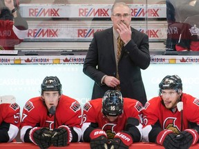 Former coach Paul MacLean behind the Senators bench. (Reuters file photo)