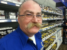 Fear not Ottawa. Mike Watson, AKA Paul McClone, is still gainfully employed and still going to Sens games, though he won't be shaving his 'stache to pass for a Dave Cameron lookalike. (AEDAN HELMER/OTTAWA SUN)