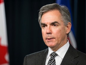 Premier Jim Prentice speaks about the suspension of Bill 10 during a press conference at the Alberta Legislature in Edmonton, Alta., on Thursday, Dec. 4, 2014. Ian Kucerak/Edmonton Sun/ QMI Agency