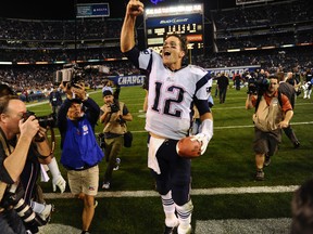 New England Patriots quarterback Tom Brady celebrates his team’s 23-14 win over the San Diego Chargers at Qualcomm Stadium Sunday. (Robert Hanashiro/USA TODAY Sports)