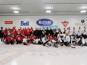 Participants in Tuesday's NHLPA Goals and Dreams Cup line up before facing off. (Lindsey Gibeau, Valberg Imaging)