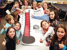 Children from the Boys and Girls Club celebrate with Richard Kelch, the 2014 United Way of Sarnia-Lambton Campaign chair. The United Way has surpassed its $1.92-million goal by over $30,000. The Boys and Girls Club is one of 22 funded agencies of the United Way.SUBMITTED PHOTO