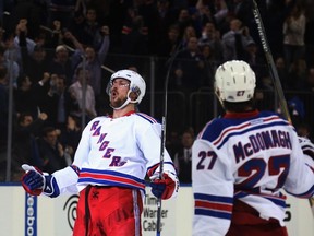 Kevin Klein #8 of the New York Rangers celebrates his game winning goal at 3:45 of overtime against the Pittsburgh Penguins at Madison Square Garden on December 8, 2014 in New York City. (Bruce Bennett/Getty Images/AFP)