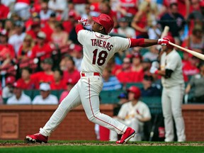 St. Louis Cardinals right fielder Oscar Taveras hits a solo home run off of San Francisco Giants starting pitcher Yusmeiro Petit (not pictured) during his major league debut in the fifth inning at Busch Stadium on May 31, 2014. Jeff Curry-USA TODAY Sports