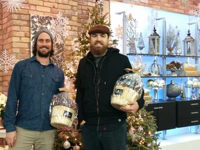 Matt Barnes, left, and Nathan Colquhoun, two of the owners of Sarnia's Refined Fool Brewing Co., stand on the set of The Marilyn Denis Show Monday in Toronto. The Sarnia craft brewery was included in a gift segment on the CTV talk show, and handed out gift baskets to members of the studio audience. SUBMITTED PHOTO