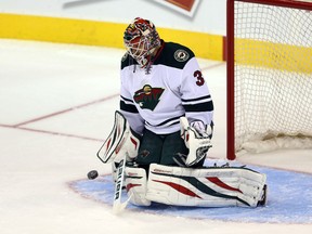 Minnesota Wild goalie Ilya Bryzgalov (30) warms up during the second period against the Winnipeg Jets at the MTS Centre on Sep 22, 2014. Bruce Fedyck-USA TODAY Sports