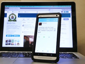 Acting Insp. Chris Barry of Belleville Police Service said inappropriate comments posted on Twitter by user “The Copper” from the account “@BPS_Finest”, above on smartphone, may be linked to a member of the city police force. An internal social media investigation was launched Tuesday.(Photo illustration by Jerome Lessard/QMI Agency)