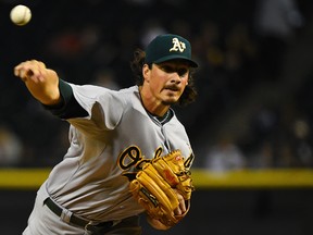 Oakland Athletics starter Jeff Samardzija throws a pitch against the Chicago White Sox during the first inning at U.S Cellular Field. (Mike DiNovo/USA TODAY Sports)