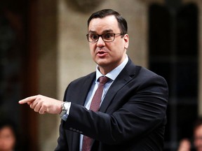 Canadais Industry Minister James Moore speaks during Question Period in the House of Commons on Parliament Hill in Ottawa, Nov. 26, 2014. (CHRIS WATTIE/Reuters)