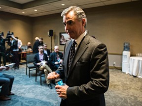 Alberta Premier Jim Prentice leaves after the Edmonton Chamber of Commerce's Premier's State of the Province luncheon at the Westin Hotel in Edmonton, Alta., on Tuesday, Dec. 9, 2014. Codie McLachlan/Edmonton Sun