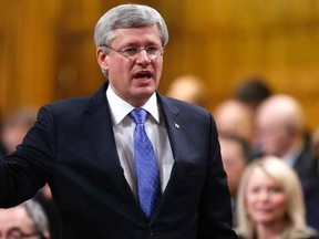 Prime Minister Stephen Harper speaks during Question Period in the House of Commons on Parliament Hill in Ottawa December 9, 2014. REUTERS/Chris Wattie