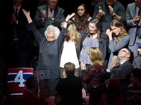 Jean Beliveau's widow, Elise, along with other family members, at the Bell Centre in Montreal as the Canadiens paid tribute to the legendary player ahead of their game against the Canucks Tuesday, Dec. 9, 2014. (QMI Agency)