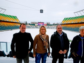 Left to right, coaches Alen Stajcic (Australia), Martina Voss-Tecklenburg (Switzerland), Roger Reijners (Netherlands) and Pia Sundhage (Sweden) tour Commonwealth Stadium on Dec. 9, 2014, in advance of the 2015 Women’s World Cup. Photo by Tom Braid/Edmonton Sun