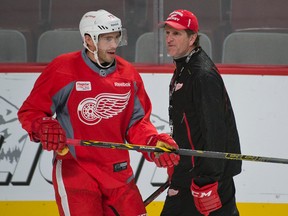 Detroit Red Wings forward Pavel Datsyuk (left) and head coach Mike Babcock. (BEN PELOSSE/QMI Agency files)