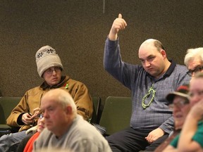 Gino Donato/The Sudbury  Star
A man gestures as city council voted to repeal bylaws regarding store hours in the nickel city, meaning businesses can set their own hours, effective immediately.