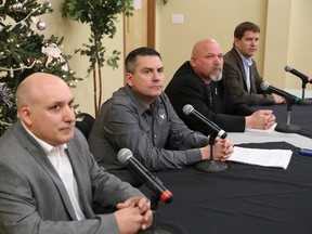 Mitch Medina, left, lead negotiator for Vale, Kelly Strong, vice-president of Ontario/UK Operations of Vale, Rick Bertrand, president of Local 6500 of the United Steelworkers, and Myles Sullivan, USW staff representative, take part in a joint news conference at the Steelworkers hall in Sudbury, ON. on Wednesday, Dec. 10, 2014. JOHN LAPPA/THE SUDBURY STAR/QMI AGENCY