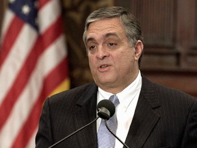 Former CIA director George Tenet is pictured in this February 5, 2004 file photo. (Reuters files)