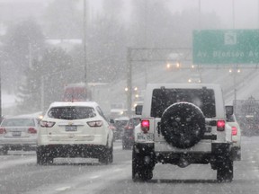Cars travel down the 417 in Ottawa Wednesday Dec 10  2014. The commute home Wednesday might be a little slower than normal as Ottawa is expecting 20 cms of snow tonight.  Tony Caldwell/Ottawa Sun/QMI Agency