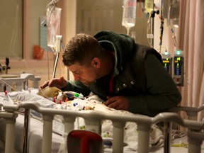 Finlay McFarlane, who has biliary atresia, is seen here at Sick Kids hospital with dad Travis. Finaly is just one patient being featured in the hospital's fundraising campaign which began November and runs until Dec. 21.